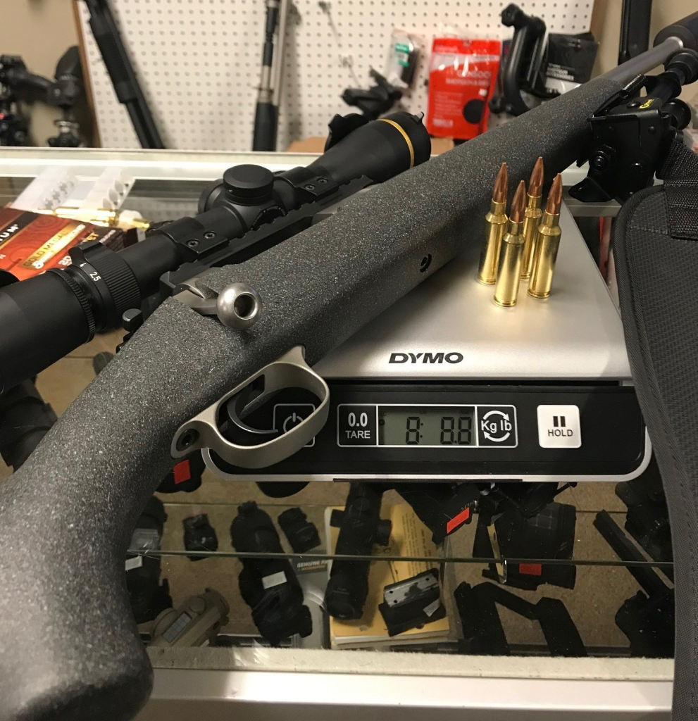 Barrett Fieldcraft rifle chambered in 6.5 Creedmoor on a scale