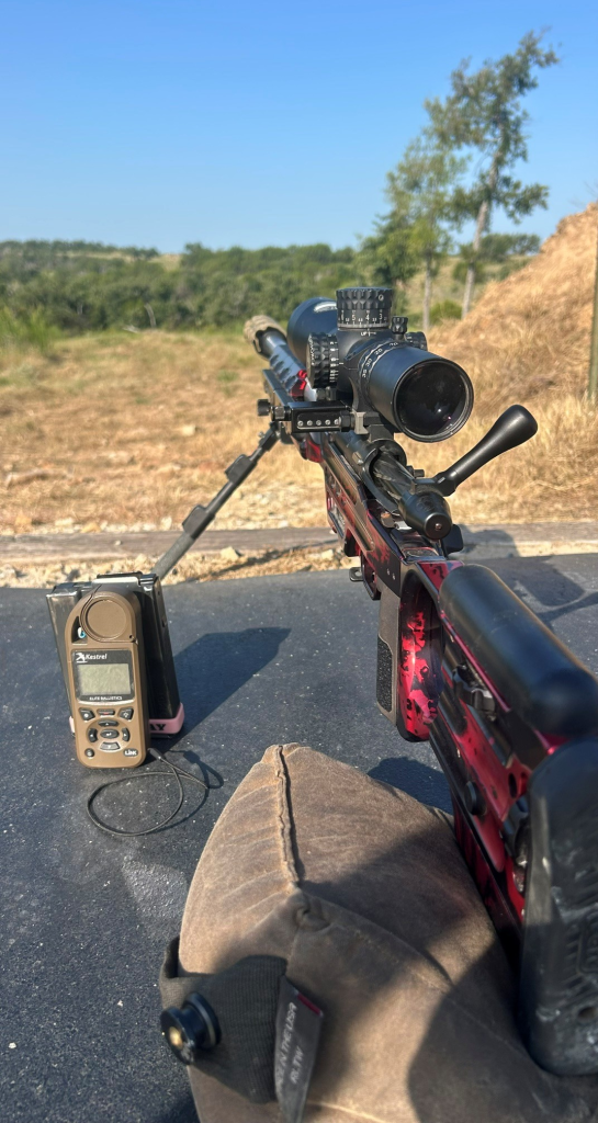 Precision rifle and Kestrel ballistic weather meter set up for long-range shooting