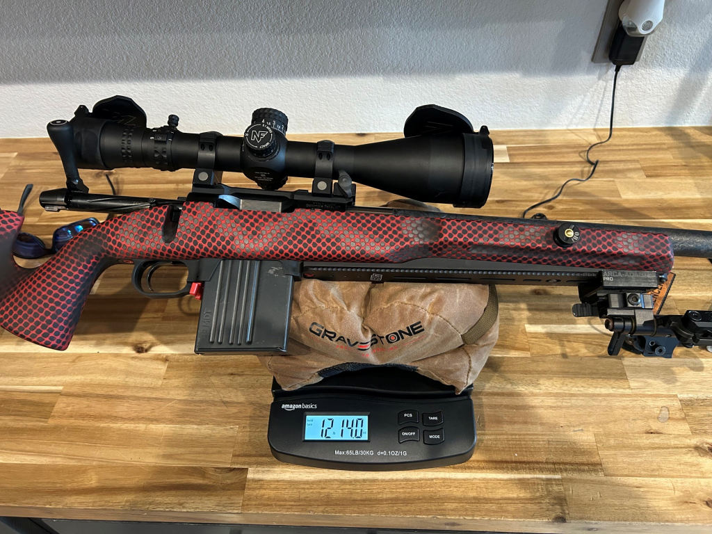 6.5 Creedmoor Sportsman rifle weighing 12 pounds 14 ounces