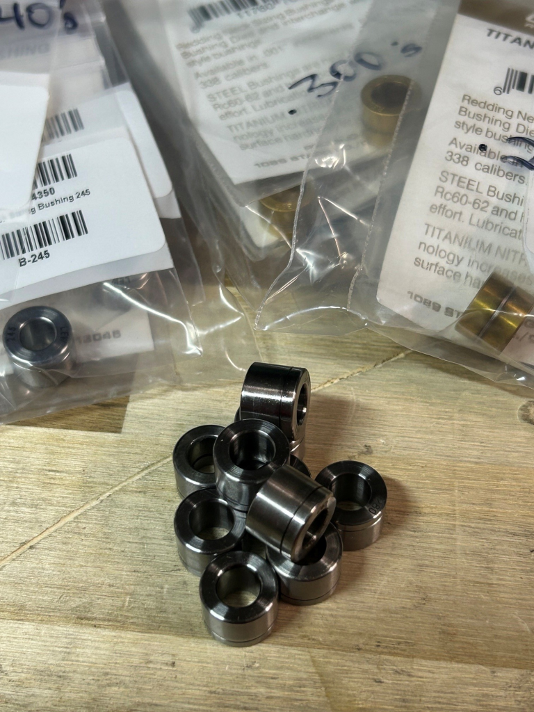 Assorted neck-sizing bushings used in precision rifle reloading dies